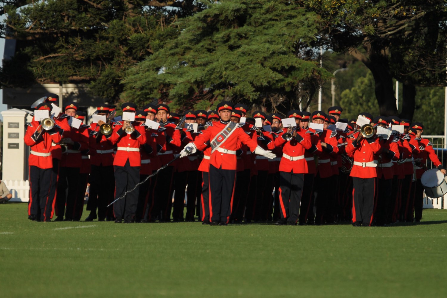 The Grey band in ceremonial red on the school fields