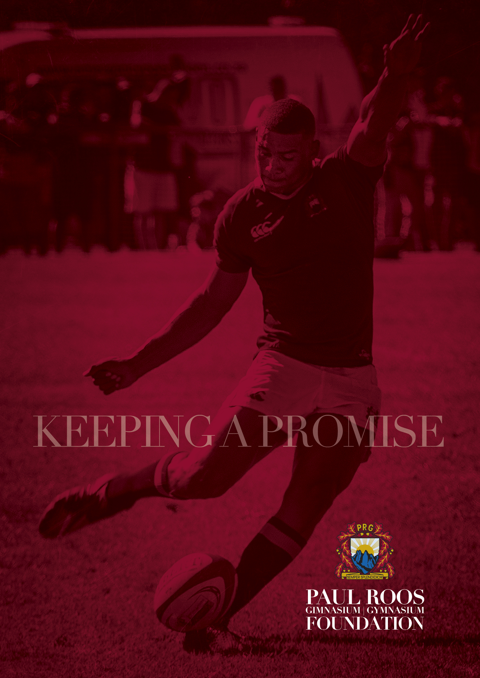 A Paul Roos boy taking a kick in the school maroon