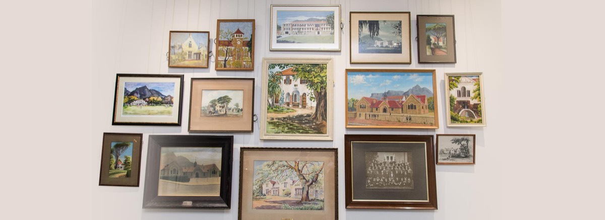 Watercolours of the school through the years on display in the Old Boys' Union Heritage Centre